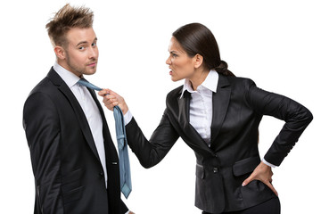 Two business people debate and fight, isolated