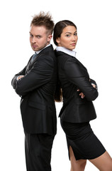Two business people stands back to back