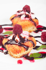 Muffins with raspberry and chocolate topping