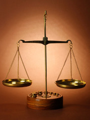 Classic scales on brown background