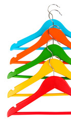 Colorful clothes hangers isolated on white