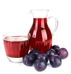 Delicious plum juice isolated on white