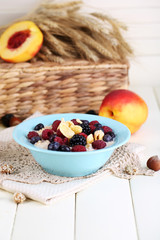 Oatmeal in plate with berries