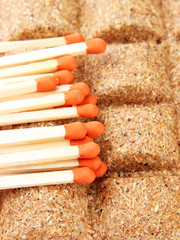 Long matches and dry fuel, close up