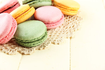 Gentle macaroons on table close-up