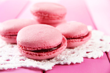 Gentle macaroons on table close-up