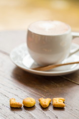 love coffee on wooden table