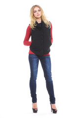 portrait of a beautiful young woman with blond hair in jeans