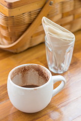 cup of hot chocolate and napkin