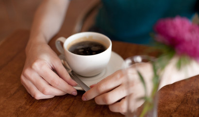 women in cafe, cup and heands