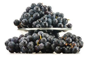 Bunch of fresh red grapes isolated on white