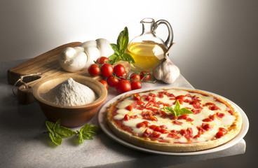 Pizza on the table whit ingredients