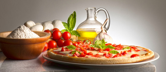 Pizza on the table whit ingredients