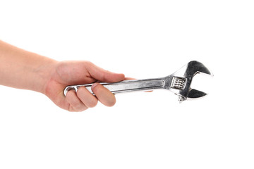 Hand holding adjustable wrench isolated