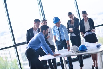 business people and engineers on meeting