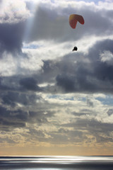paraglider at dusk