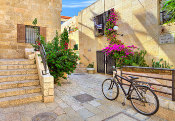 Street and stonrd houses at jewish quarter in Jerusalem.