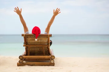 Peel and stick wall murals Boracay White Beach Santa sitting on chaise longue on white sand beach