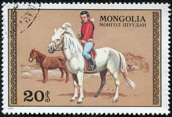 stamp printed in Mongolia shows a girl on horseback