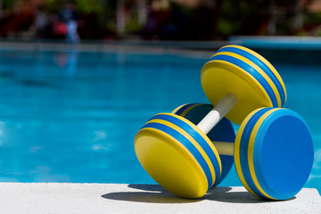 Two plastic dumbbells for water aerobics