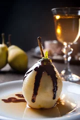 Rolgordijnen Delicious pear dessert with chocolate and amaretto liqueur © thepiwko