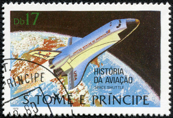 stamp featuring the Space Shuttle orbiting the Earth