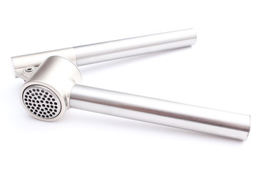 Garlic press isolated on white background