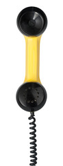 Handset of vintage yellow telephone. Clipping path
