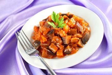 Aubergine stew with onions and tomato