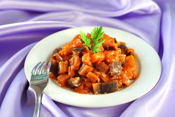 Aubergine stew with onions and tomato