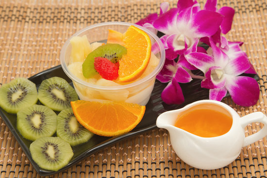 pudding fruit salad with orange juice, fusion dessert