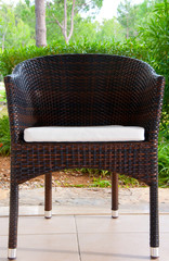 Wicker chair on the terrace