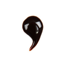 Punctuation mark  made from chocolate syrup, isolated on  white