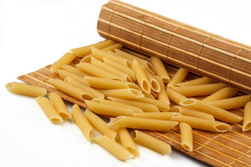 pasta from durum wheat on the mat