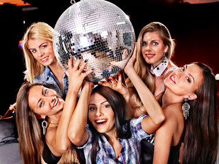 Woman on disco in night club.