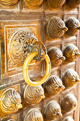 Bronze antique drawer door handle in Patan, Nepal.