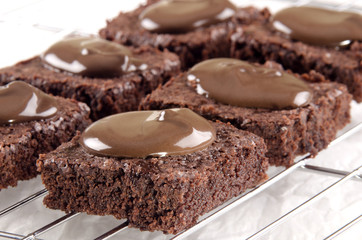brownie baked with chocolate on a cooling rack