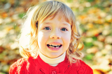 Fototapeta premium little girl missing her first tooth