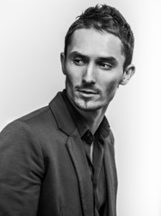 yong fashion man portrait on gray background