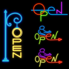 Varicolored neon signboard OPEN on a black background
