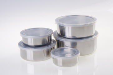stainless steel food containers on white background