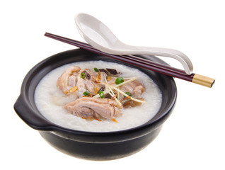 Traditional chinese porridge rice gruel served in claypot