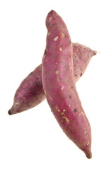 Sweet potatoes on background