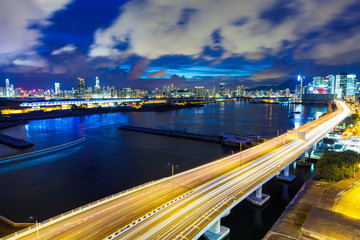 Fototapeta na wymiar Hong Kong city with highway at night