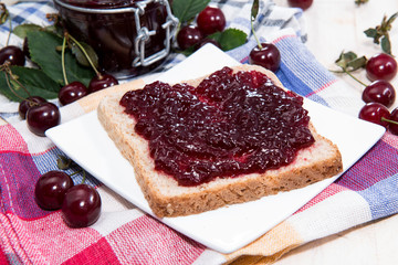 Cherry Jam Sandwich on wood