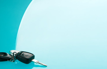 Car keys on blue background