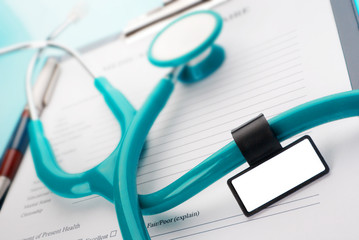 Medical questionnaire form in a clipboard on blue background