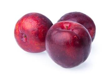 Plum. Ripe plum fruit on background