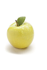 yellow apple with water drops