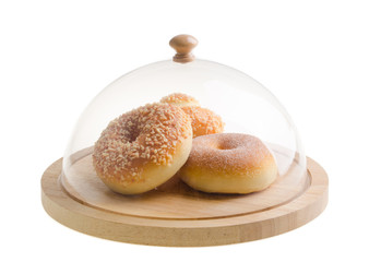 donut. donut under glass cloche